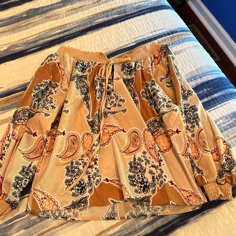 Off the shoulder blouse by Chic Me.